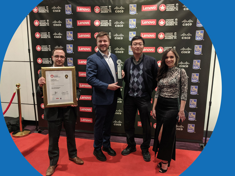 picture of the team with award at the SME